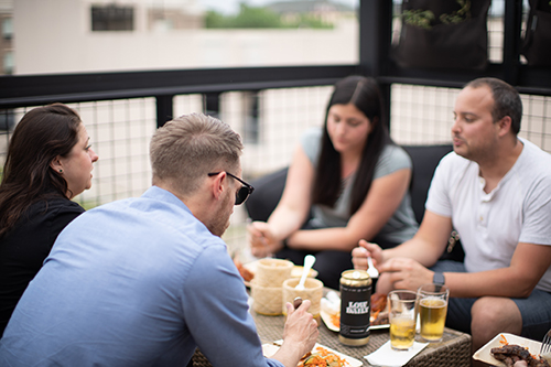 friends enjoying beer and food in burlington wisconsin